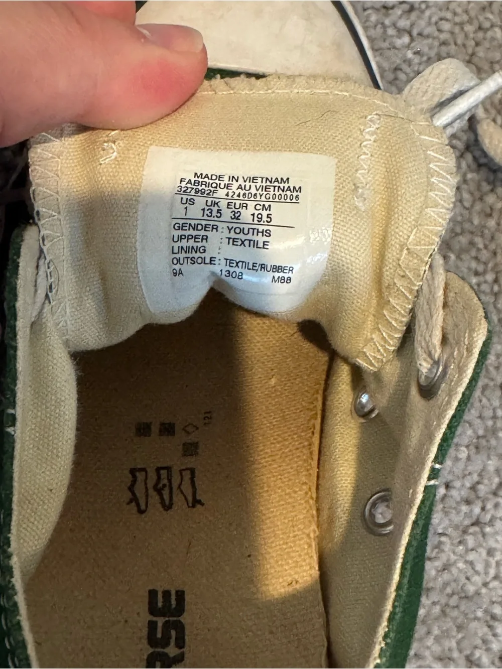 green canvas Converse Chuck Taylor All Star low top sneakers